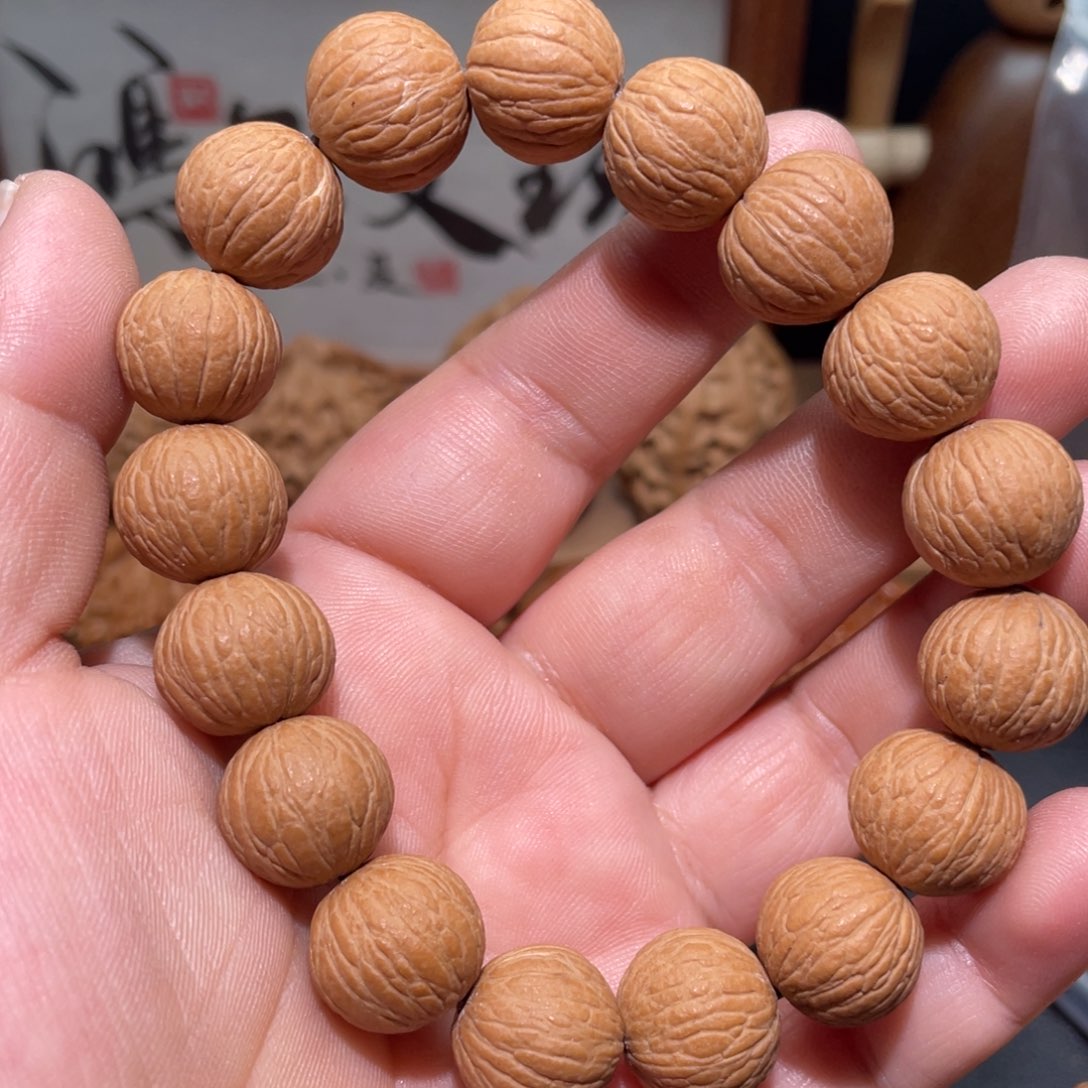 吊坠桃核凤羽猴头