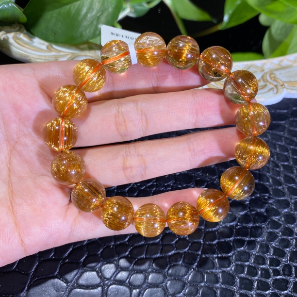 铜发晶猫眼单圈12mm左右水晶手串