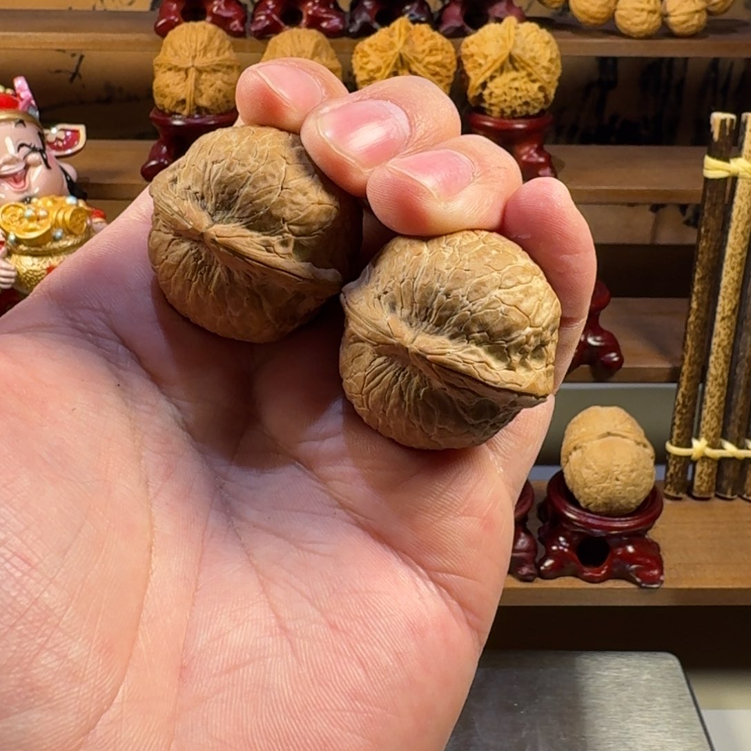 s****梦铁核桃把件蛇皮球