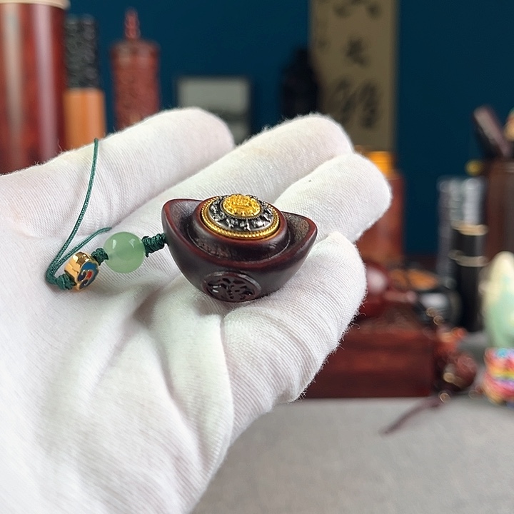 安达曼紫檀元宝手机挂件