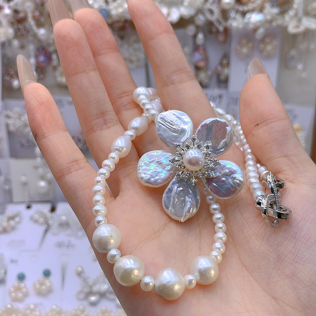 银S925镶嵌淡水珍珠耳饰雨***?