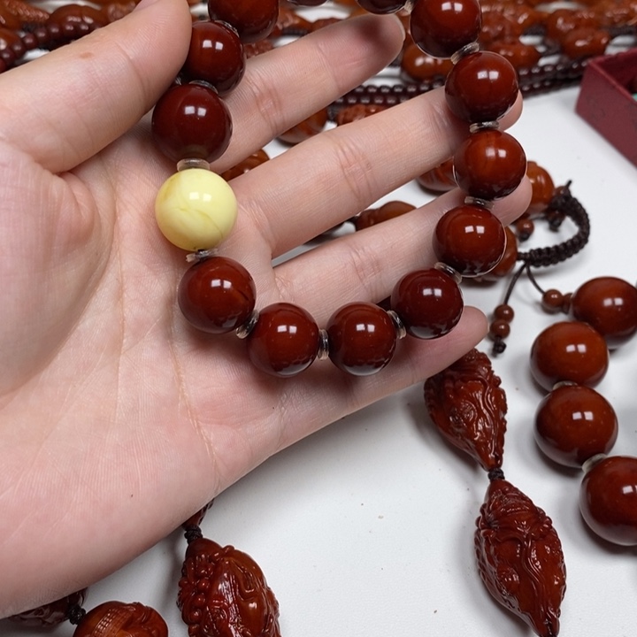 岳***⸜橄榄核雕刻工艺的发展