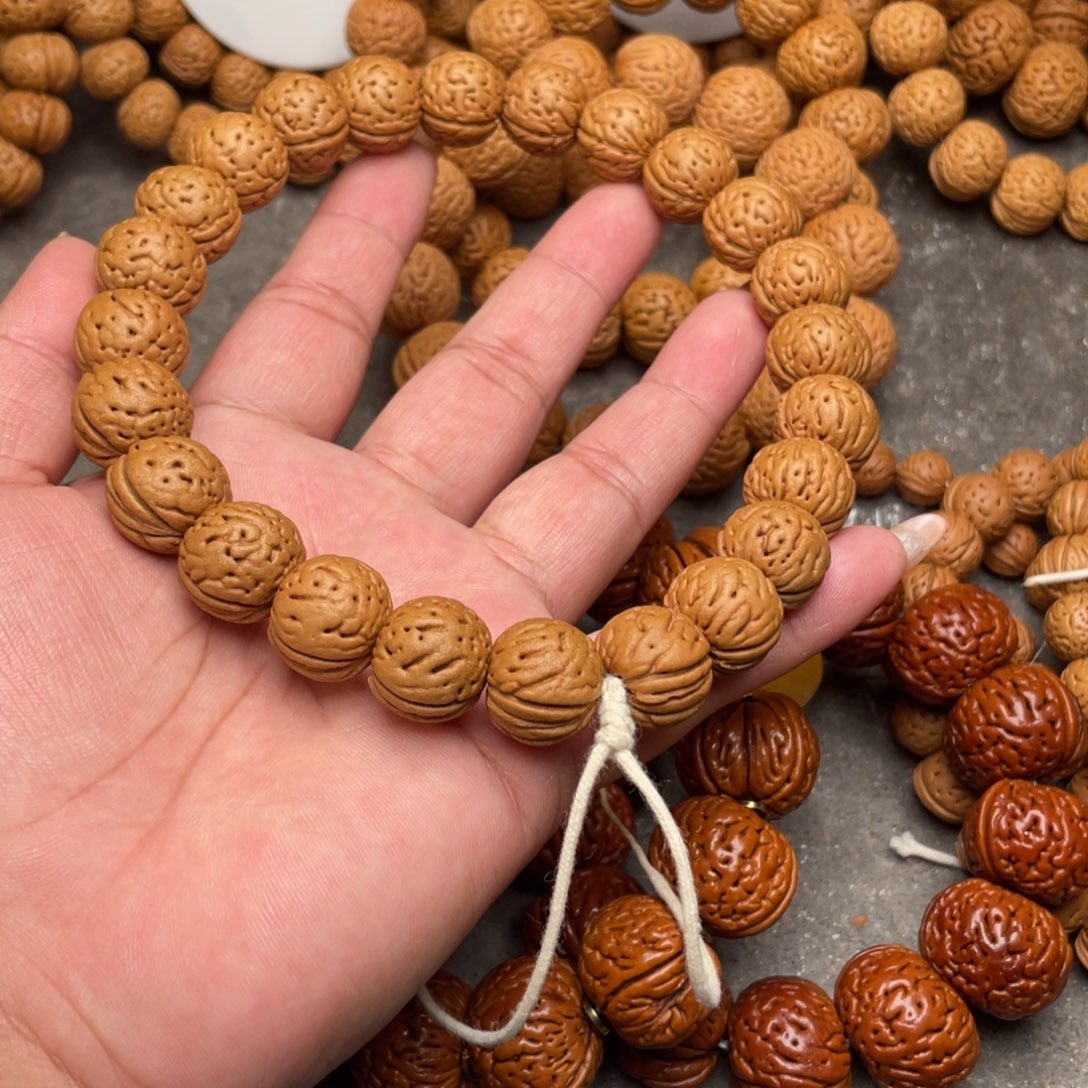 南***笙手串桃核桃核金丹闪7