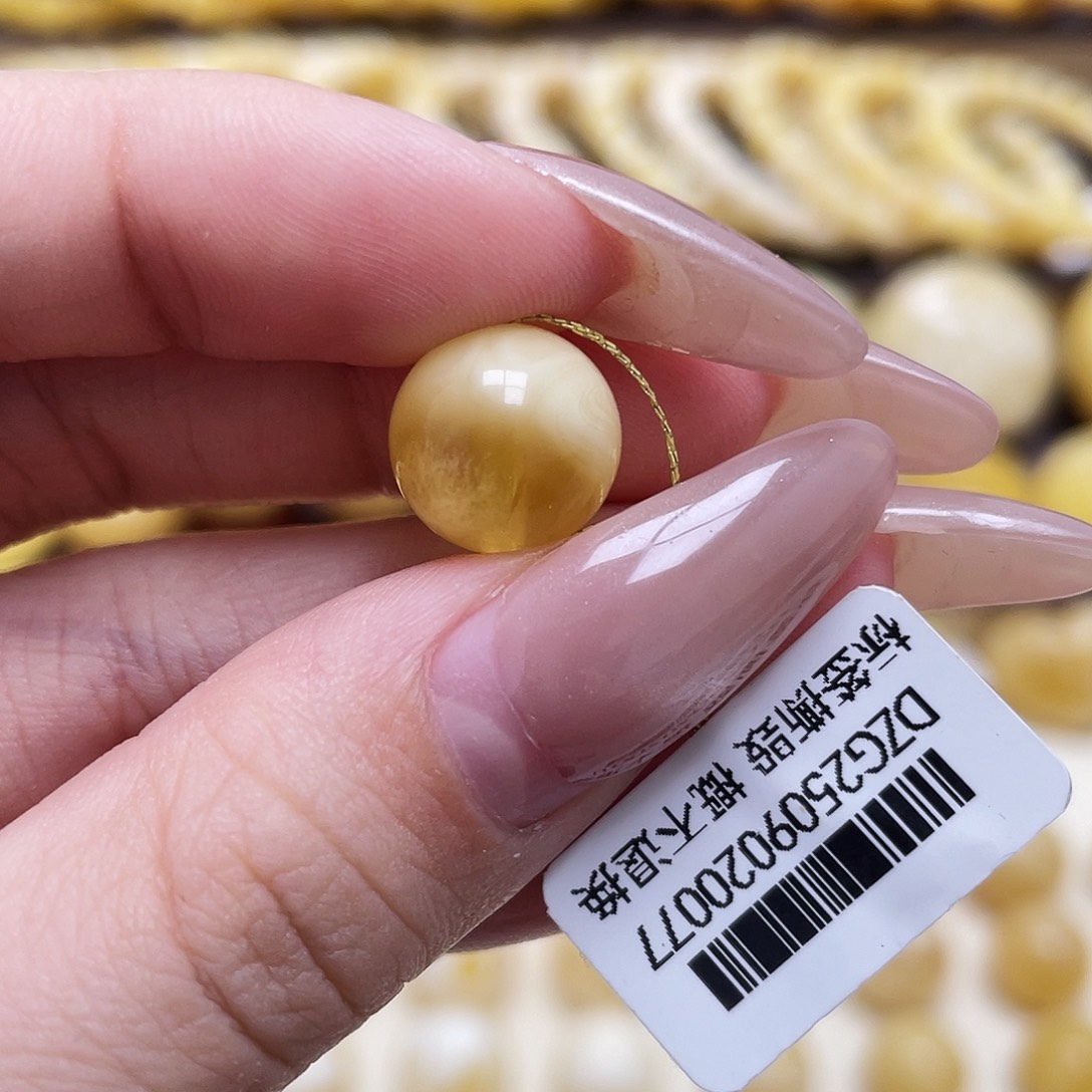 琥珀未镶嵌裸石11.6mm圆珠瑕