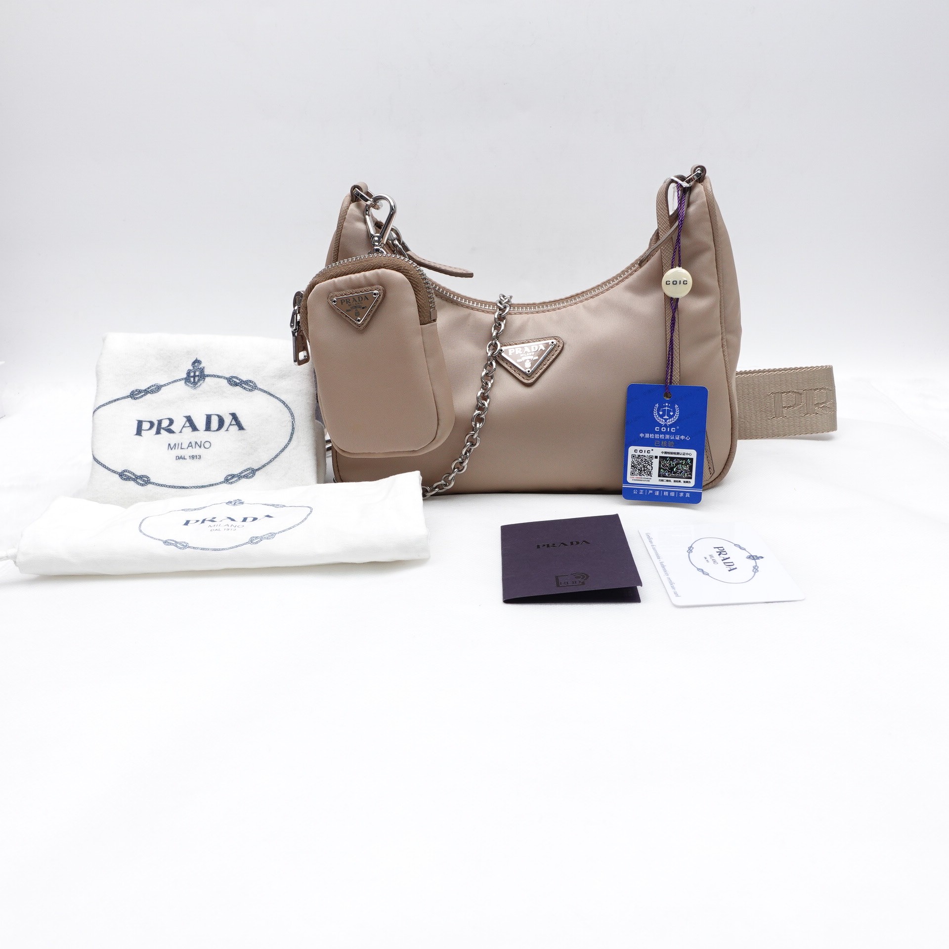 95新 Prada/普拉达 奶茶色斜挎包T10208859