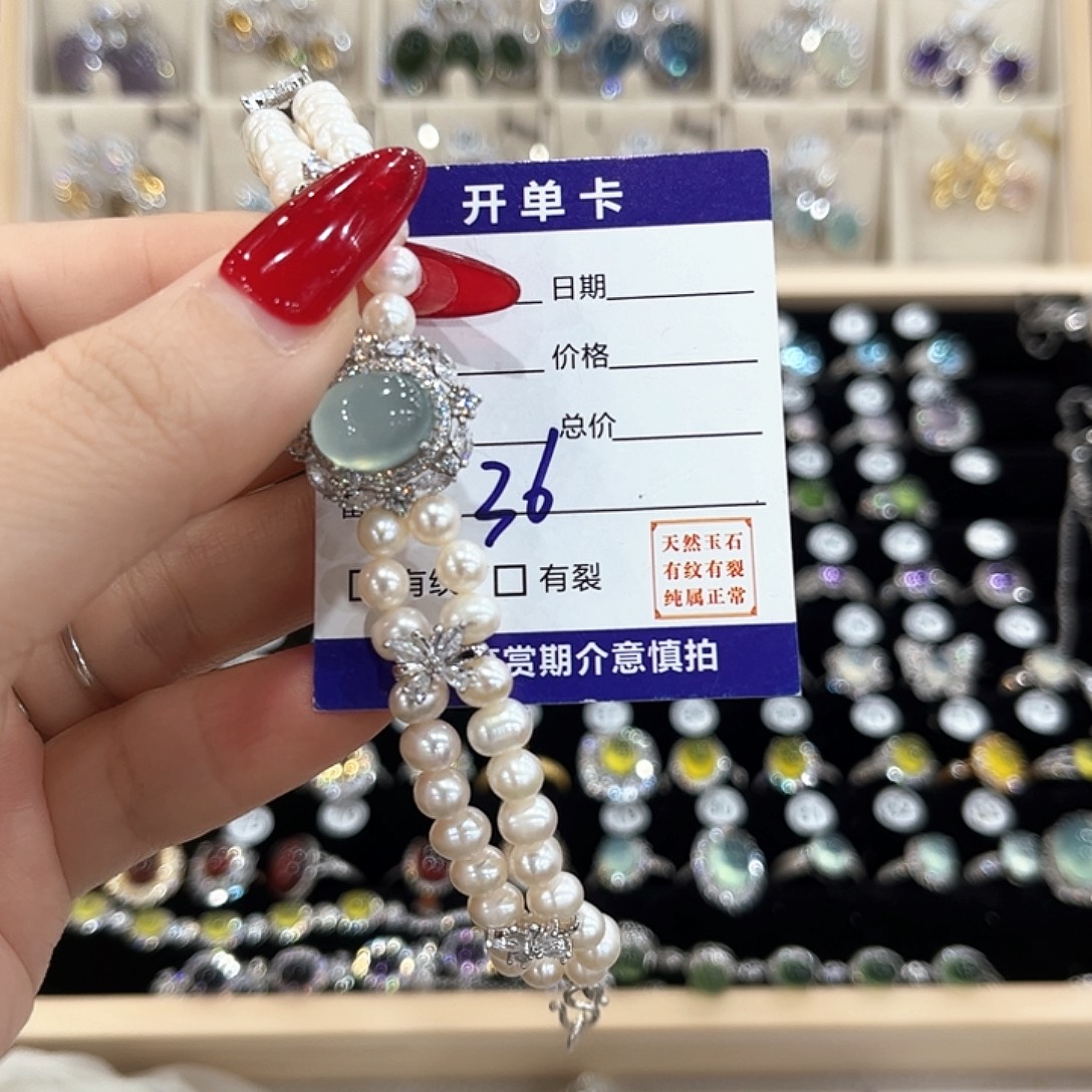 玛***甜岫玉银S925镶嵌戒指