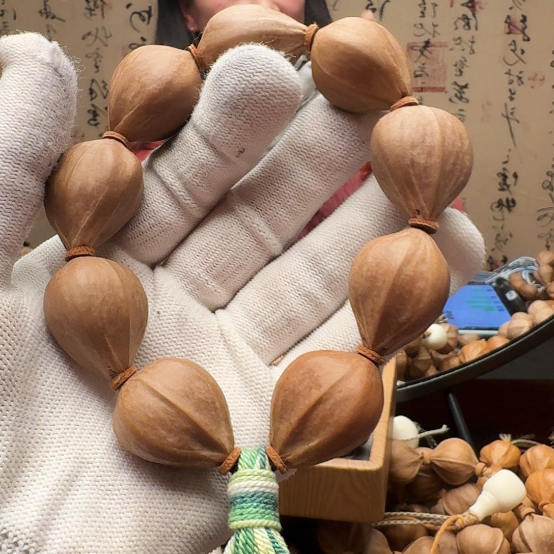 橄榄核手串铁三角