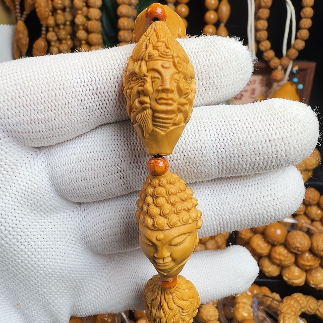 橄榄核吊坠一年佛魔