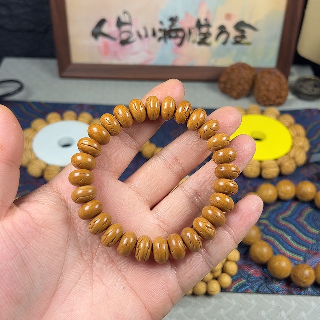 旭***涵吊坠桃核算盘单圈