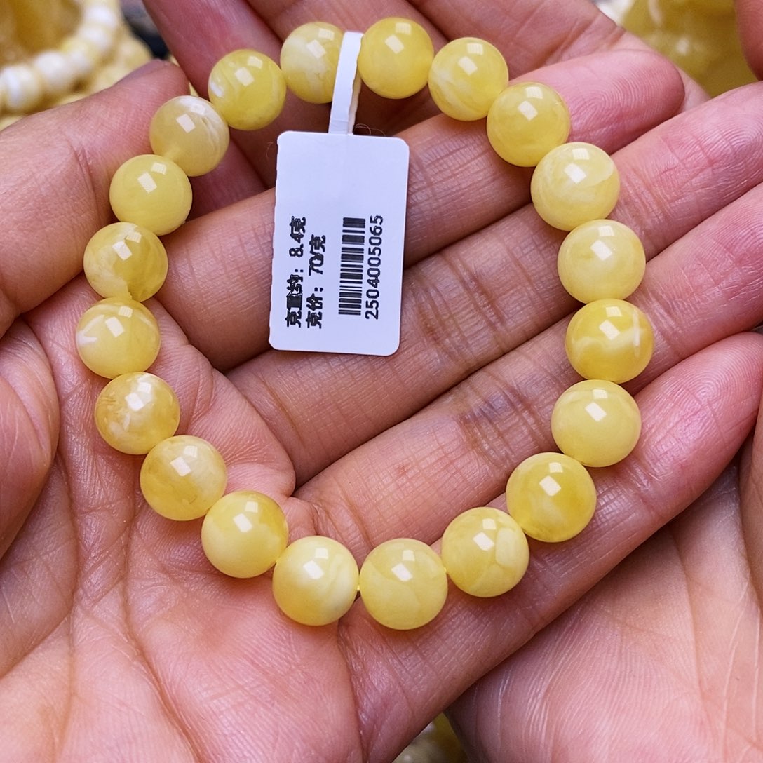 刘***琪蜜蜡未镶嵌手串9圆珠手串