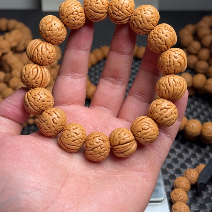 桃核手串銘*肉纹元宝