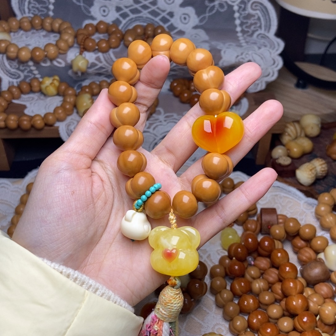 把***欢吊坠猴头核桃屁桃卡15