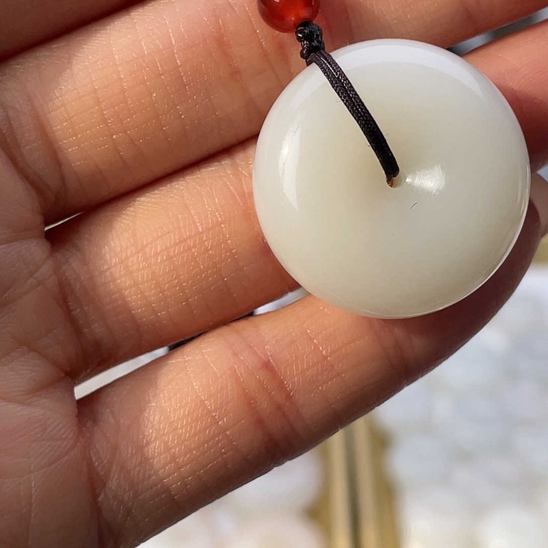 董***皓和田玉未镶嵌颈饰