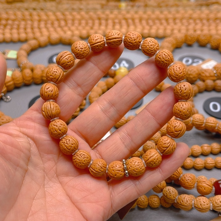 拼***持菩提籽类桃核手串