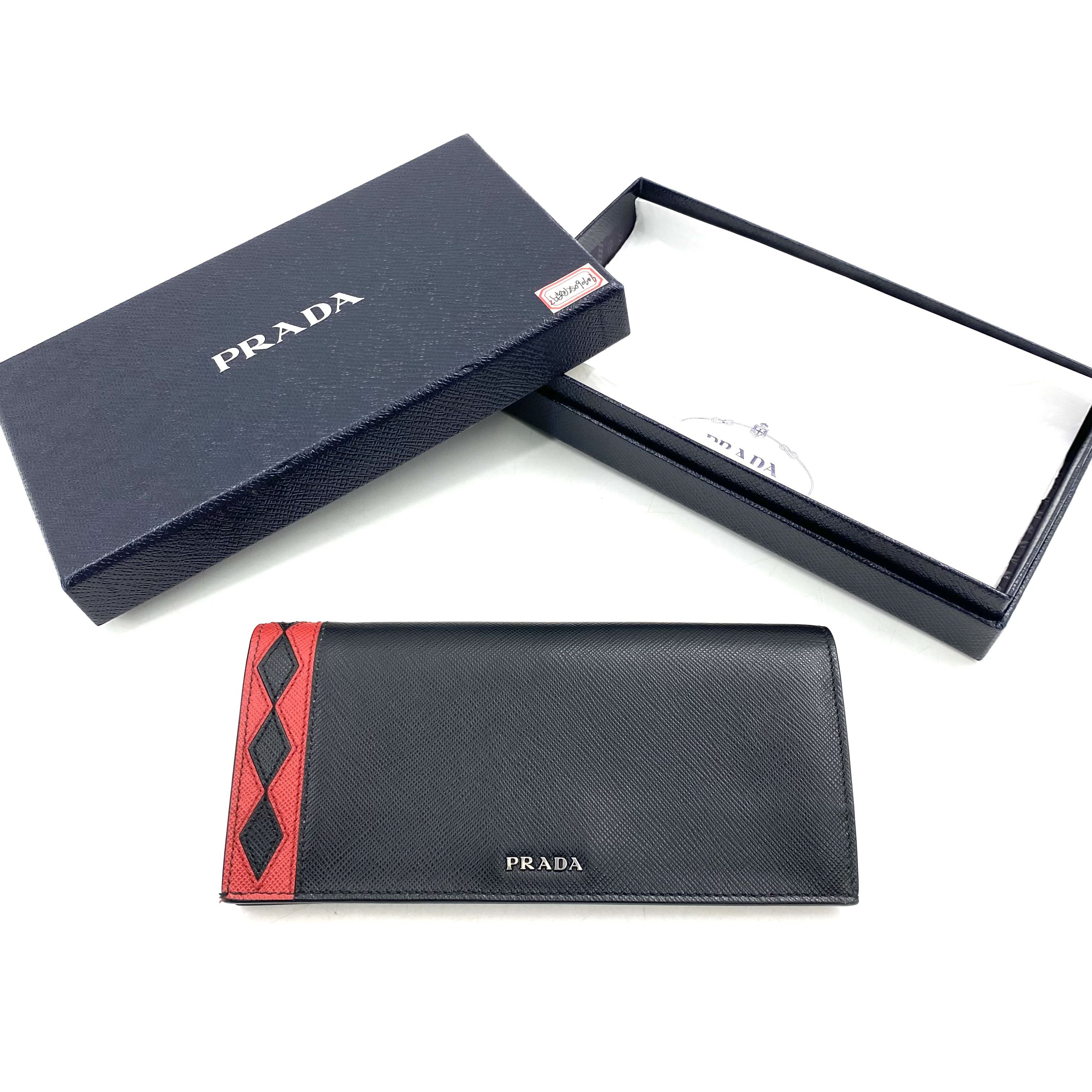 99新 Prada/普拉达 黑红拼色长款对折钱包 尺寸19/10 