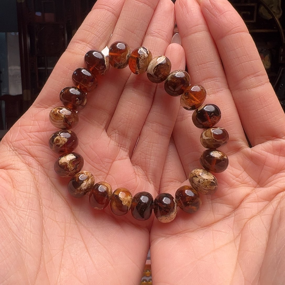 琥珀裸石未镶嵌抚顺琥珀20004-1。11mm