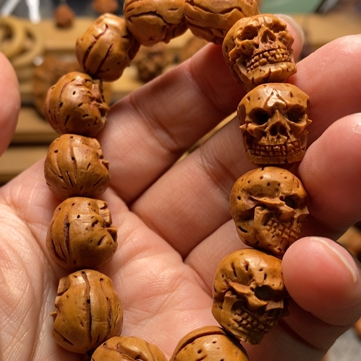 桃核手工雕刻骷髅手串