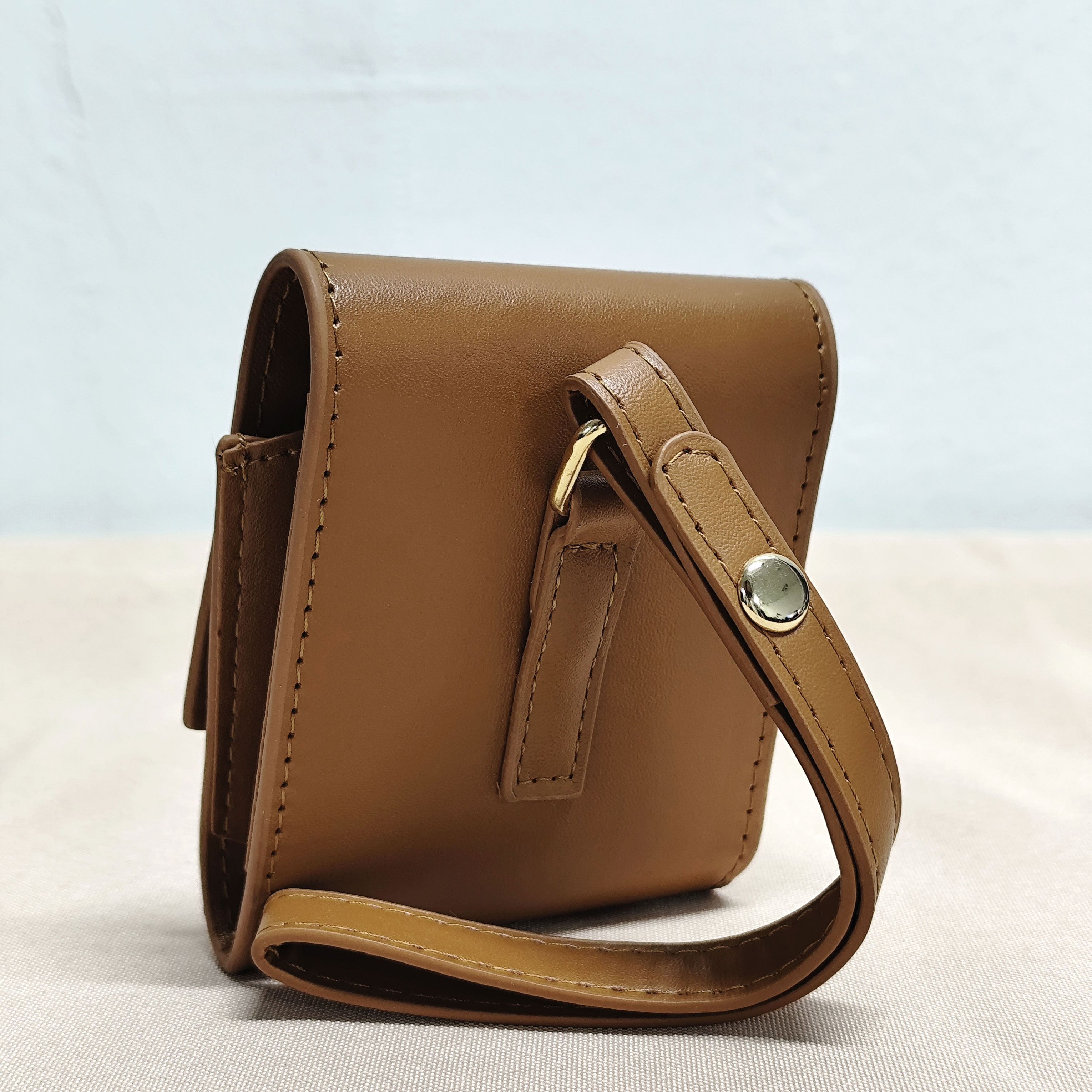 修修啊~棕色耳机化妆包推荐