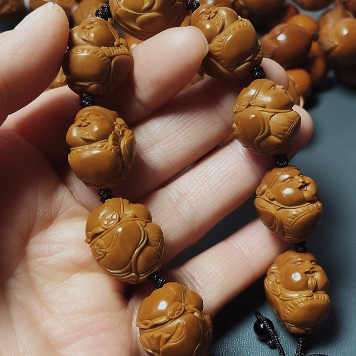 和气生财，橄榄核雕工艺