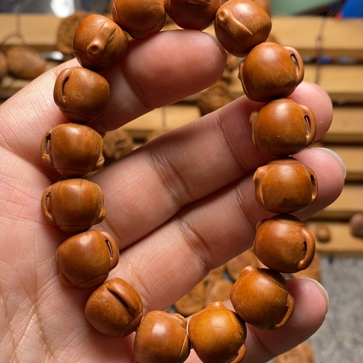 桃核雕刻茶壶又叫把把壶手串