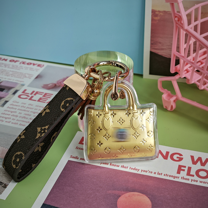 【中国金店】黄金999双面包包手机挂件钥匙扣儿童节礼物 送女友必备