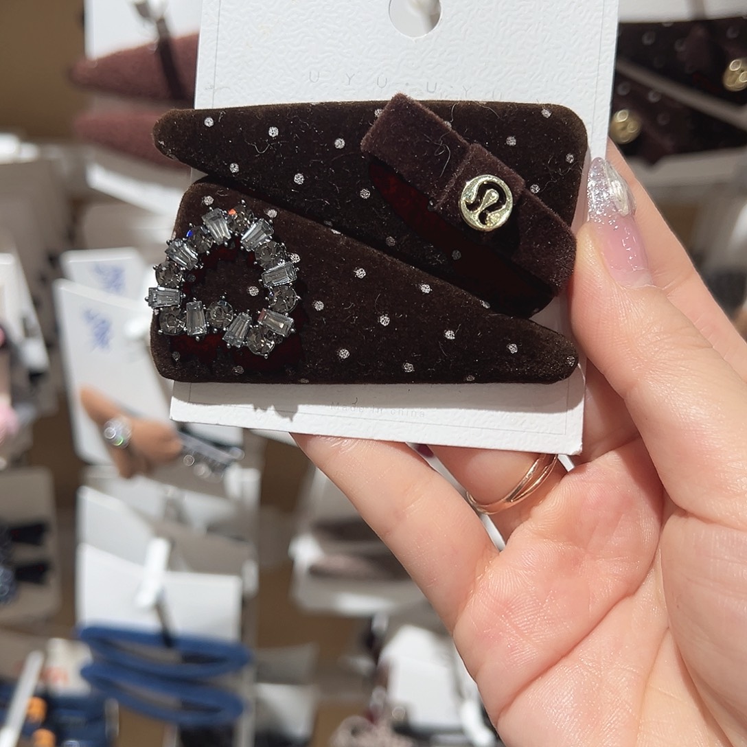 露***啊皮质铁合金咖色三角点点掰掰夹