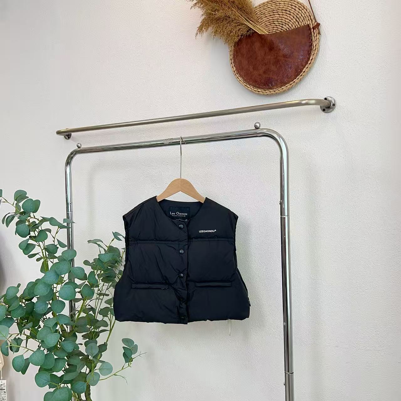 6702丽曜石黑羽绒马甲