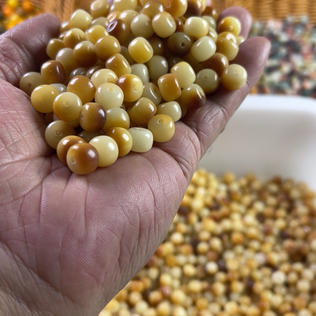 吊坠白玉菩提9-7炭烤桶珠300颗