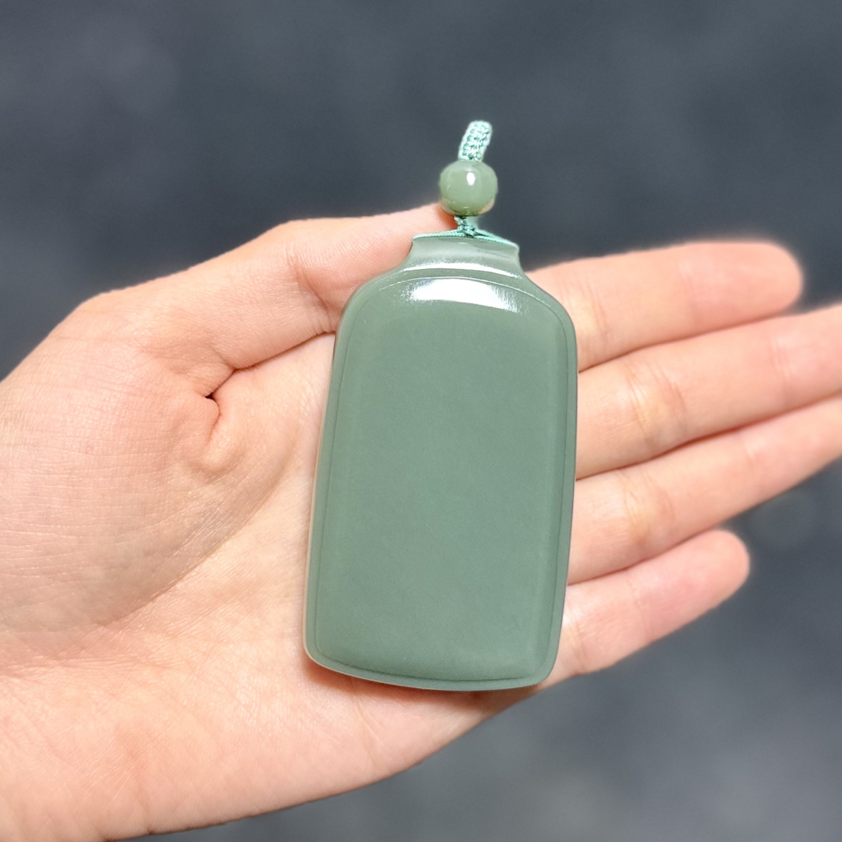 和田玉新疆沙枣青71*41*11.4无事牌纯蓝调