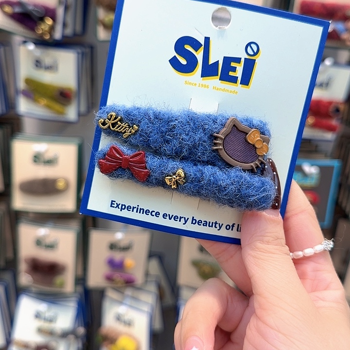 蓝色kt红蝴蝶结发夹