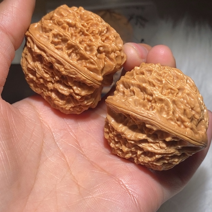 E***.桃核吊坠瑕疵有修南疆石