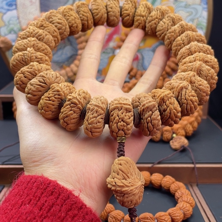 桃核手串贏**来龙纹桃核麒麟