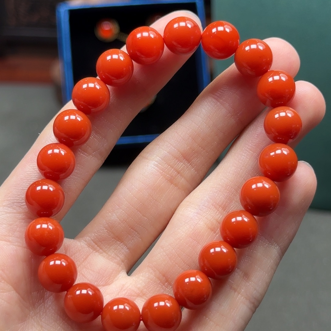 宸***光南红玛瑙未镶嵌柿子红9mm21.7g