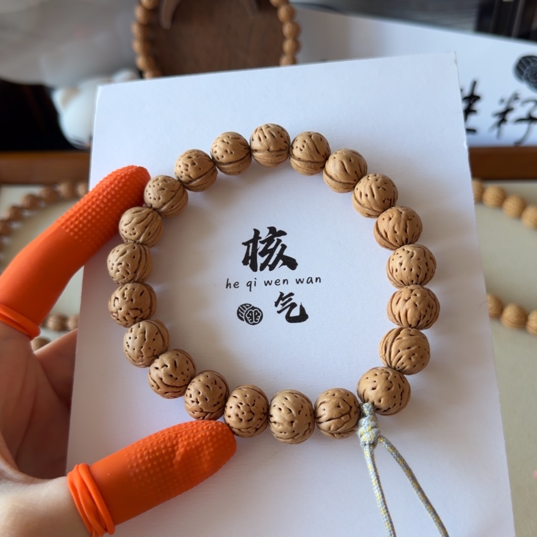兰***度野生奶油皮双面纹吊坠