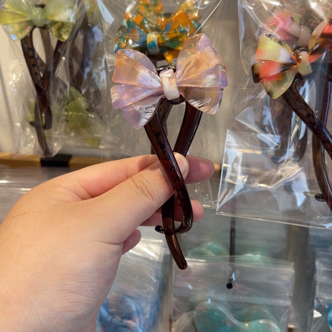 醋酸非金属紫色六瓣蝴蝶结扭扭夹