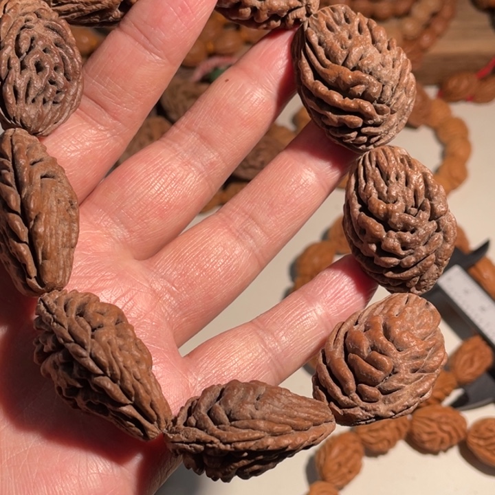 你***狸桃核手串gfffffdfcgcg