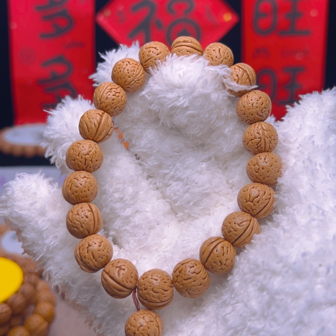 桃核手串1.2加满天星小肌肉