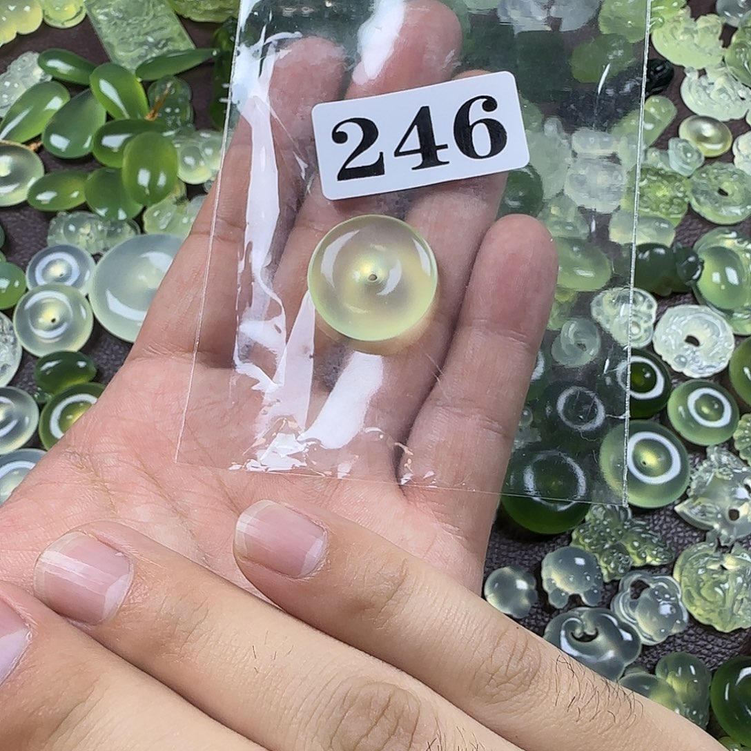汤***圆蛇纹石玉未镶嵌岫玉吊坠