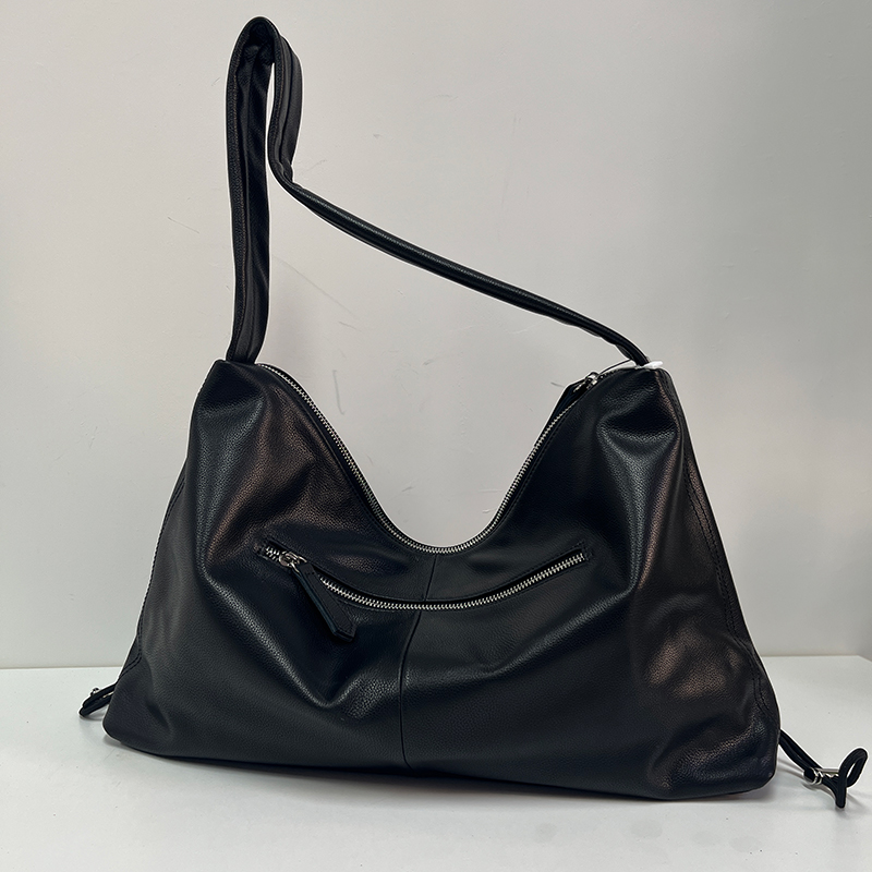 头层牛皮斜挎包民族风女士包包时尚简约褶皱单肩款饺子包