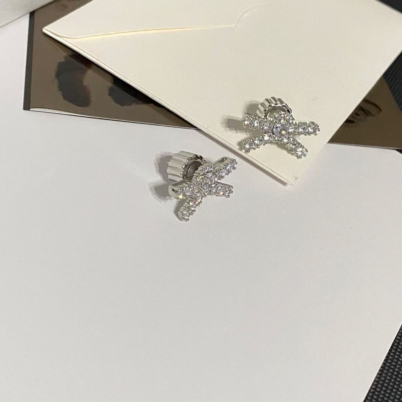 铜合金耳饰 C403银色蝴蝶结闪闪耳钉耳饰