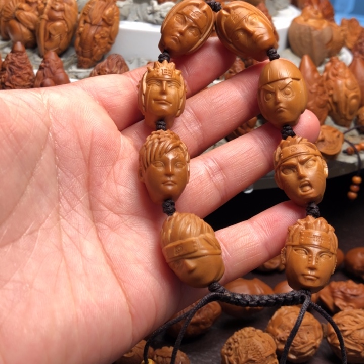 s***e吊坠橄榄核橄榄核雕刻的手串