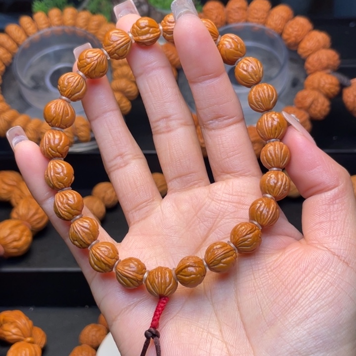 桃核手串铭****n1.1尺寸玉龙脊（29号链接）