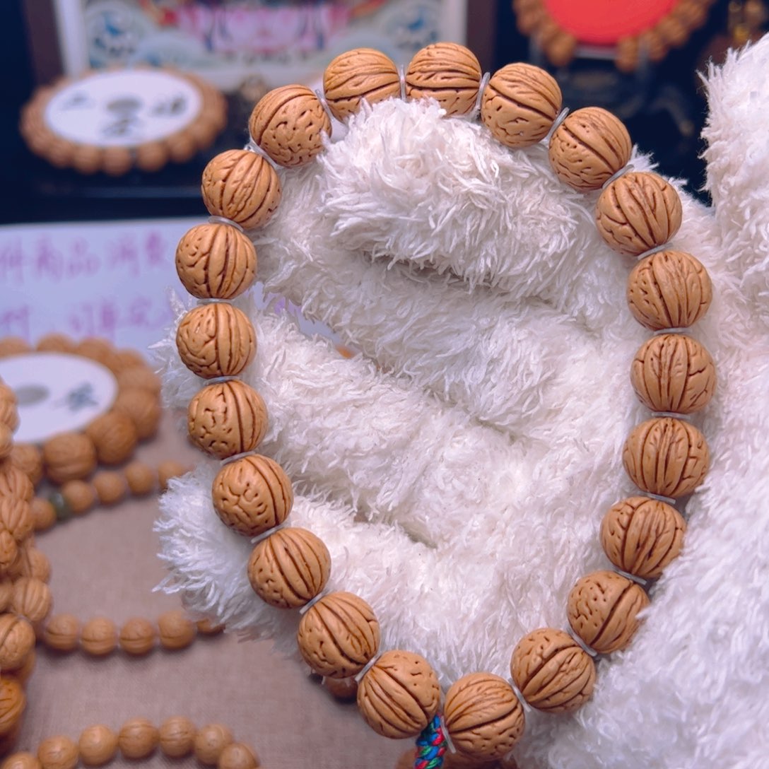 桃核手串用****8野生肥脐三道金