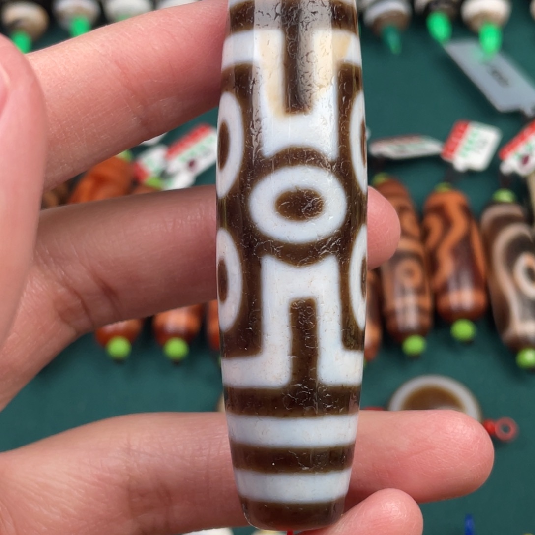 鼎***羽玛瑙/玉髓裸珠77 18.8 行运七眼图腾