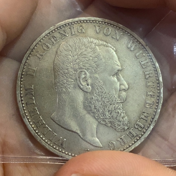 I***n银Ag900如图一个纪念银币