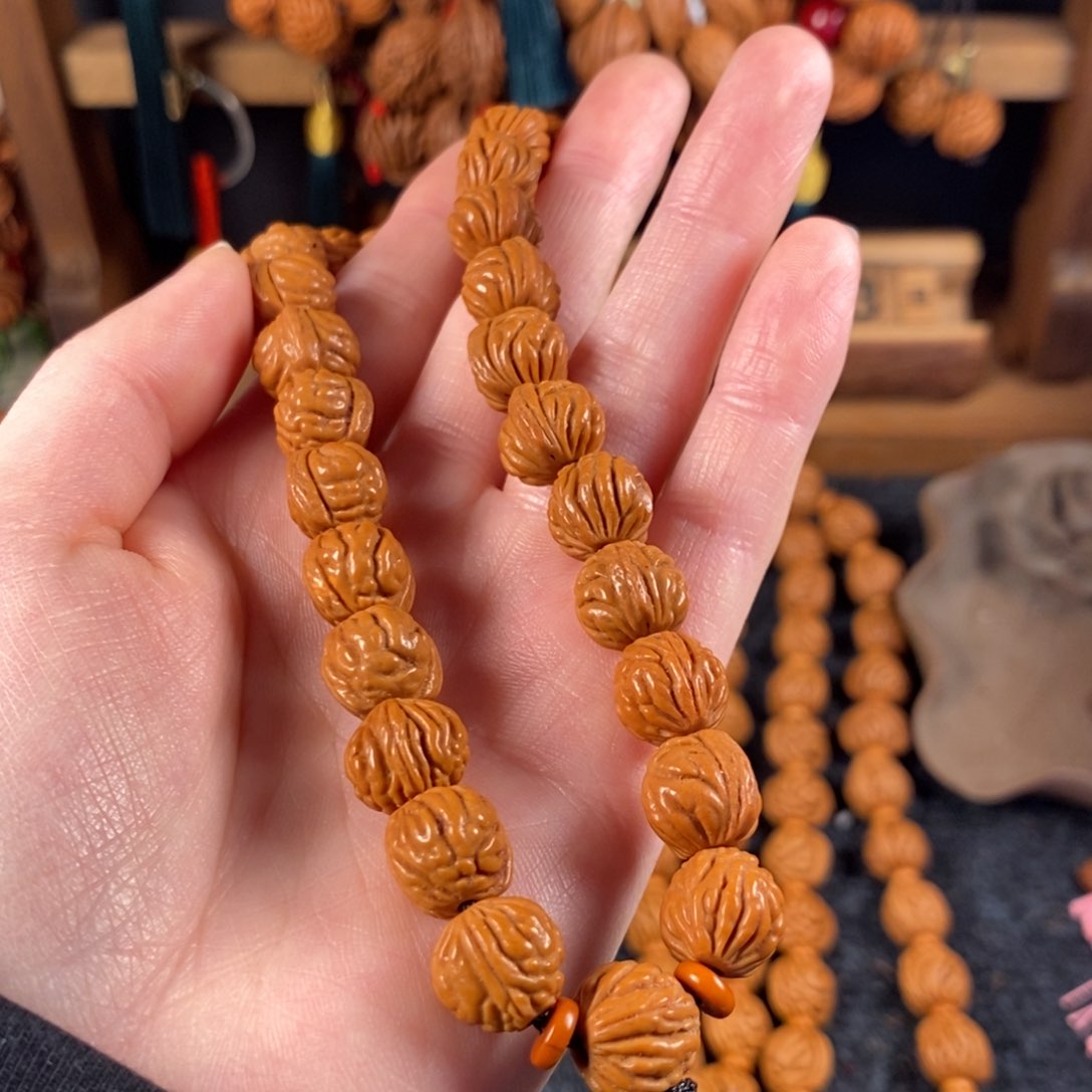 吊坠桃核桃枭手串