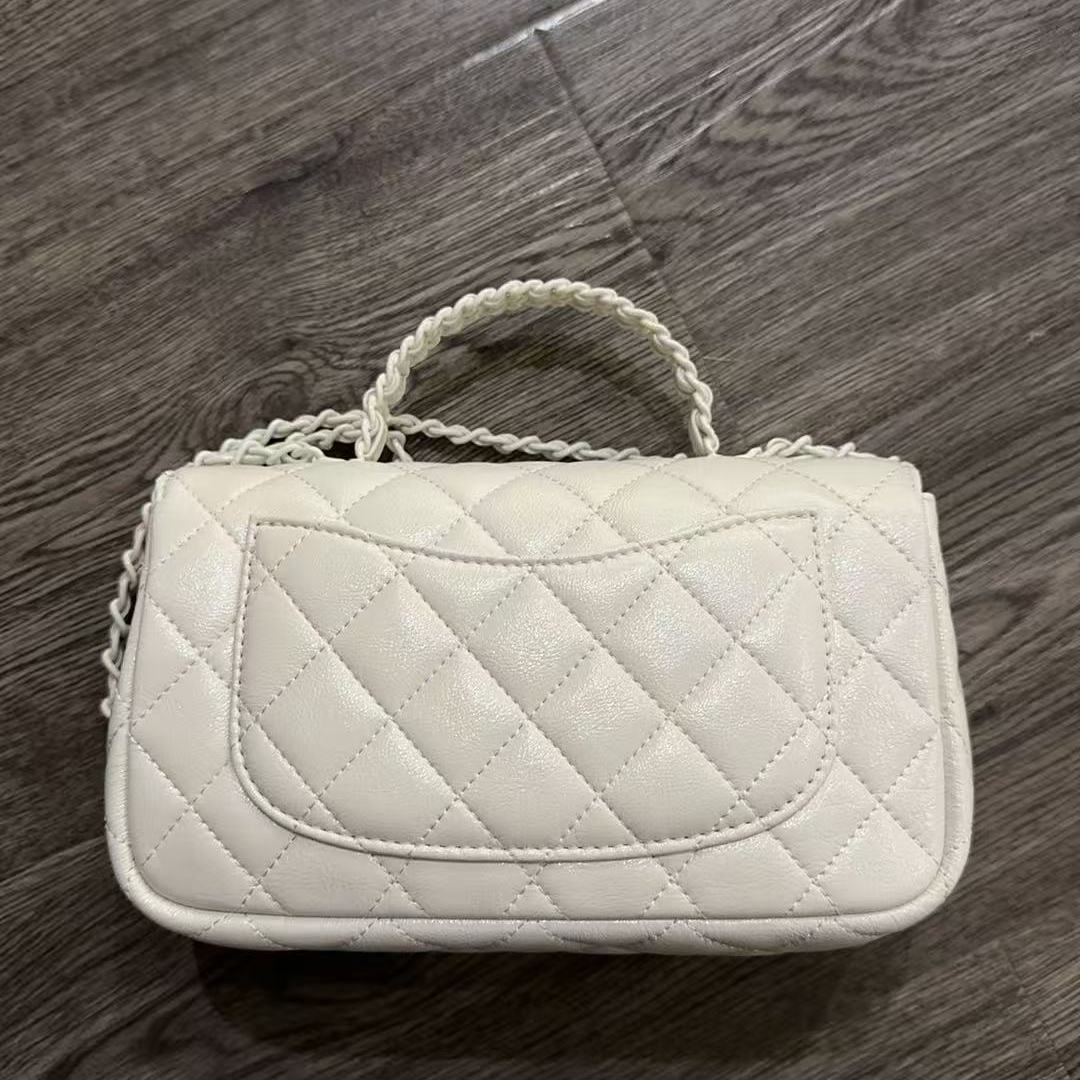 2025新款真皮女包白卷手提MG25-018