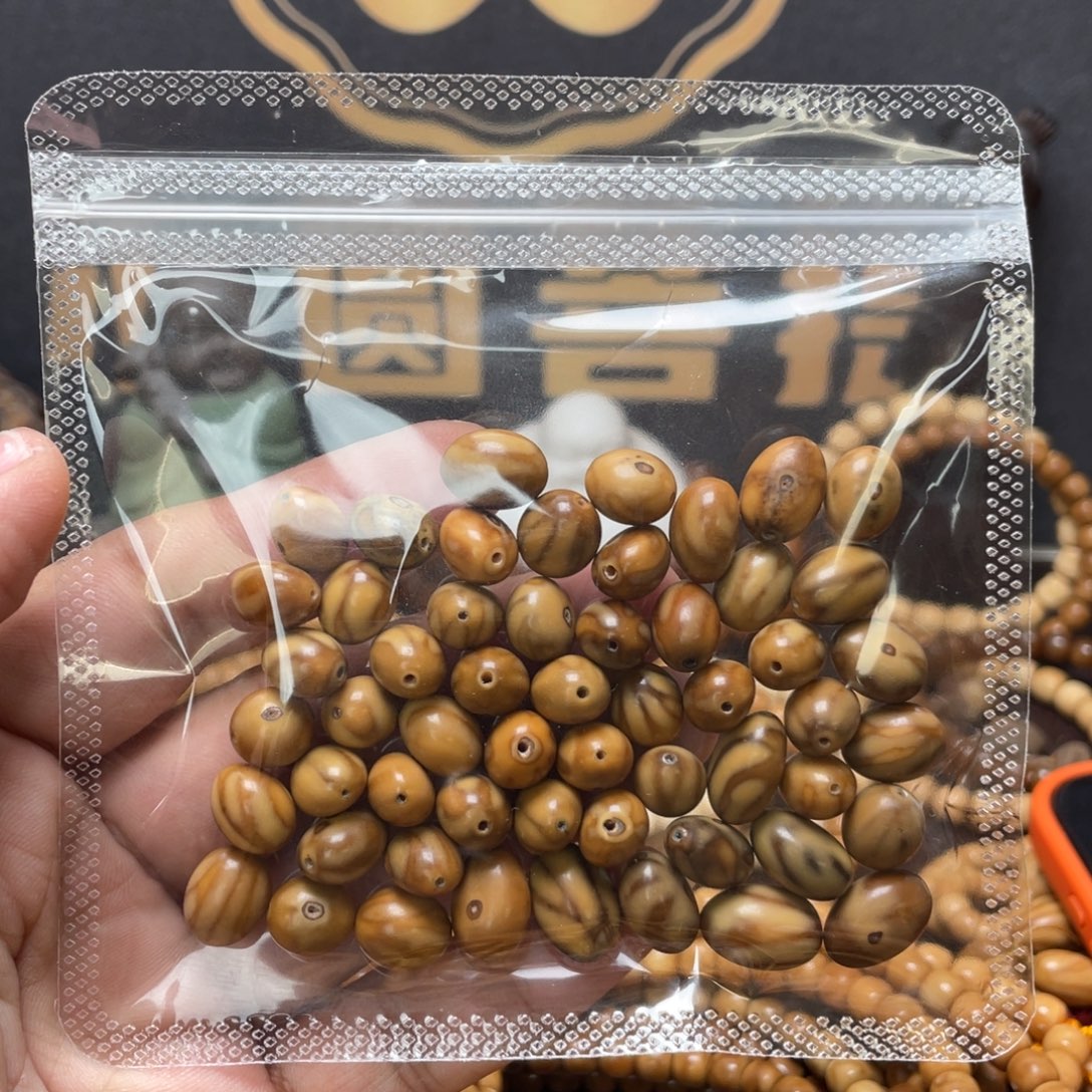 猫***鞋龙眼菩提吊坠龙脊菩提妖花龙蛋手持55粒老料无科技