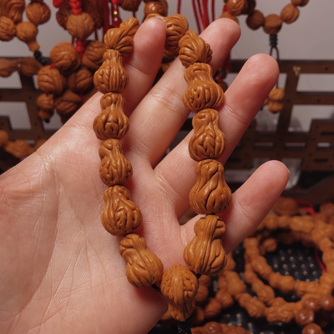 木质类龙纹桃枭手持