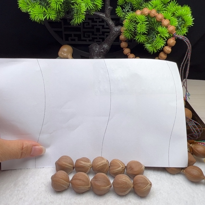 哈***儿手串/手链橄榄核1.9*2.1原皮三花铁核10颗